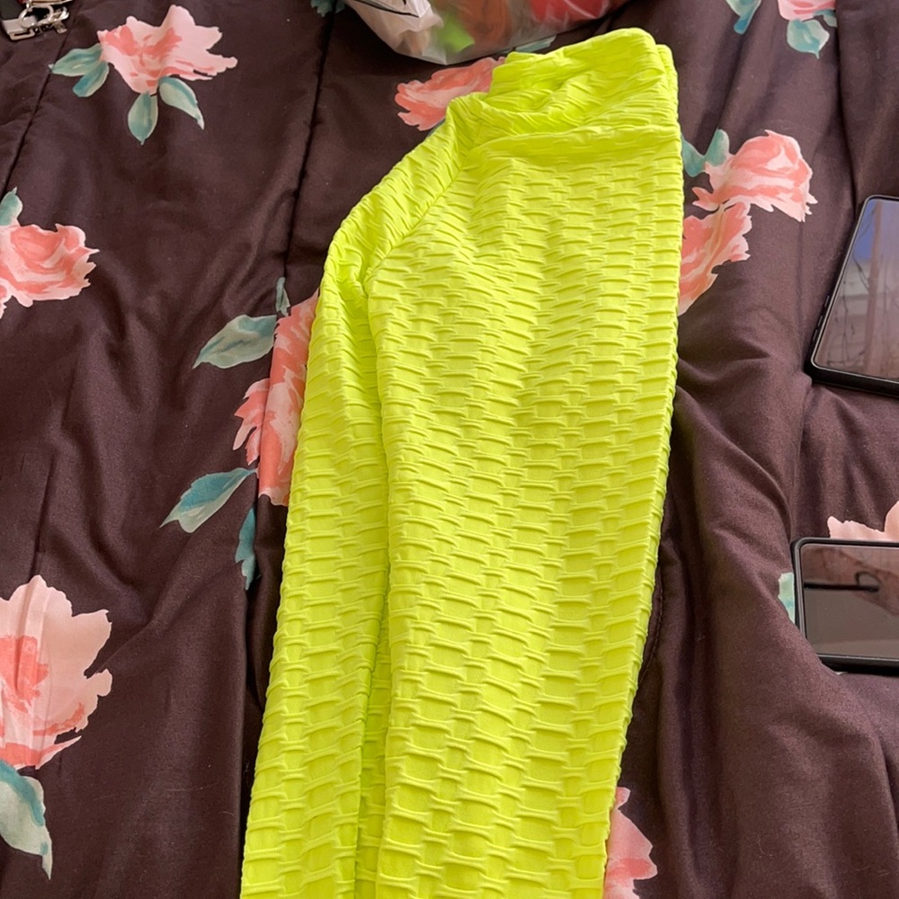 Bright yellow workout pants